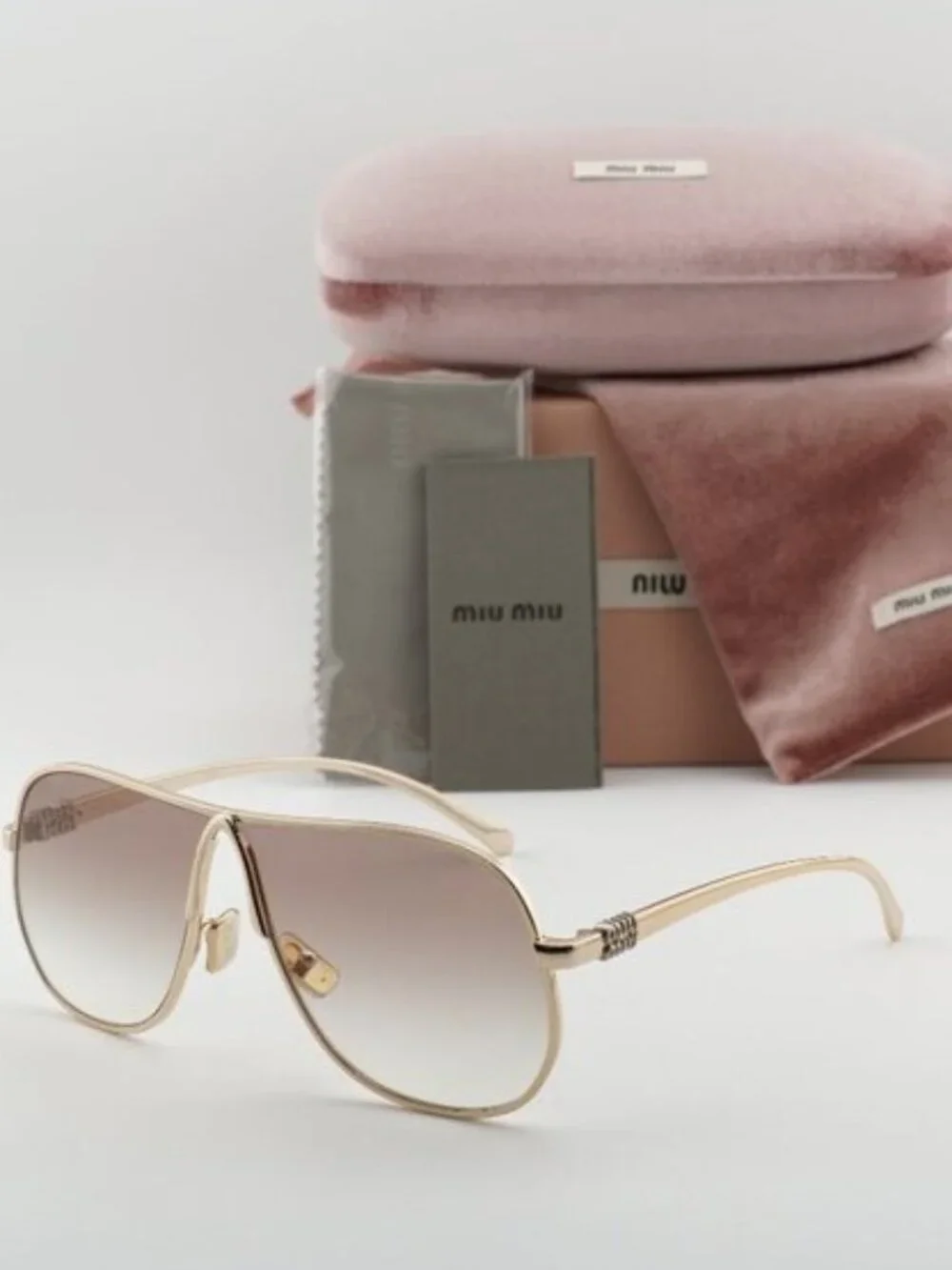 Miu Miu MUA56S 5AK90L Geometric Sunglasses – Gold/Brown Gradient